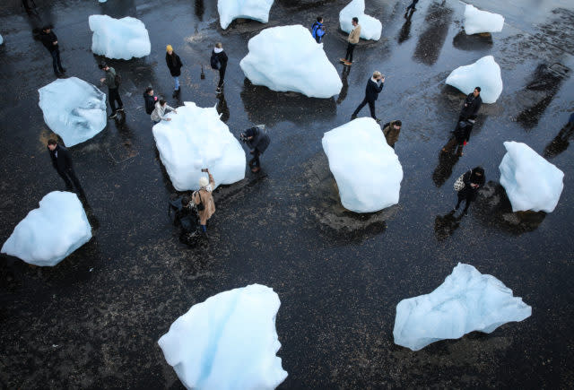 Ice Watch, which Eliasson has created from 24 blocks of ice taken from the waters of the Nuup Kangerlua fjord in Greenland (Matt Alexander/PA)