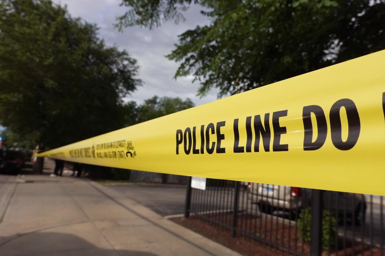Police tape surrounds a crime scene where three people were shot at the Wentworth Gardens housing complex in the Bridgeport neighbourhood on 23 June, 2021 in Chicago, Illinois. Chicago saw a surge of shootings over the Fourth of July weekend (Getty Images)