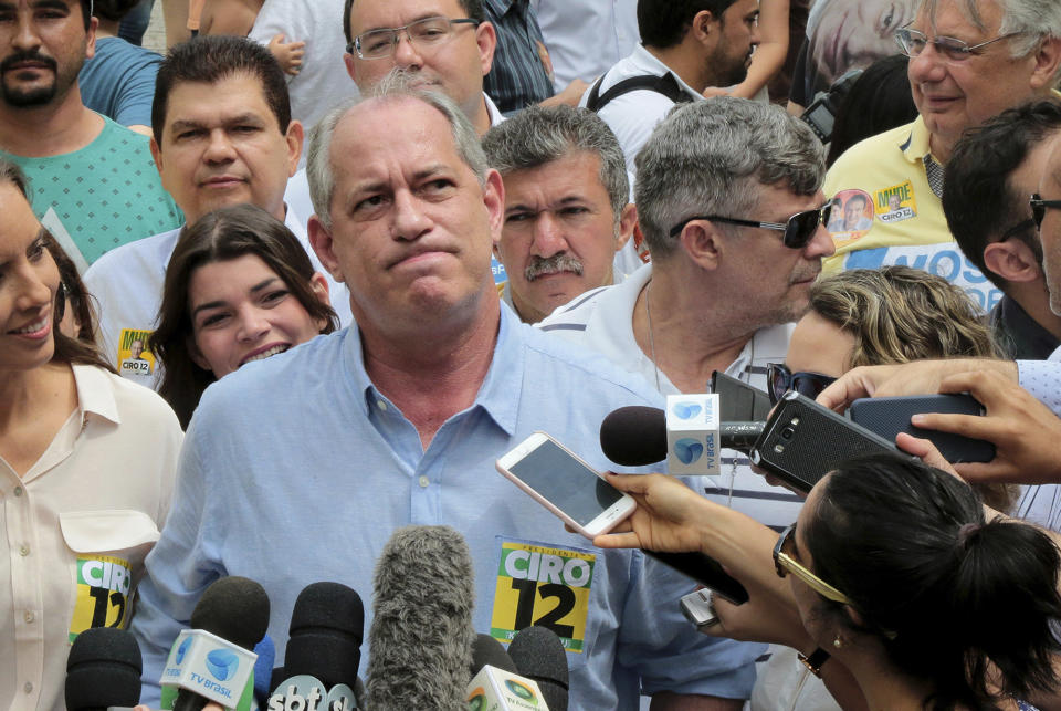 Ciro Gomes, presidential candidate of the Democratic Labor Party, considers his response while speaking with reporters, after voting in the general elections, in Fortaleza, Brazil, Sunday, Oct. 7, 2018. Brazilians choose among 13 candidates for president Sunday in one of the most unpredictable and divisive elections in decades. If no one gets a majority in the first round, the top two candidates will compete in a runoff. (AP Photo/Edmar Soares)