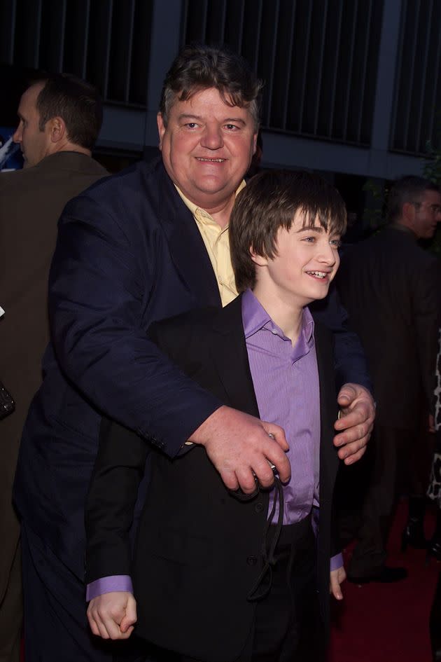 Robbie Coltrane with Daniel Radcliffe at the New York premiere of Harry Potter And The Philosopher's Stone in 2001 (Photo: Evan Agostini via Getty Images)