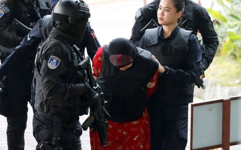 Siti Aisyah, an Indonesian suspect in the murder of Kim Jong-nam arrives at court to hear the first ruling - Credit: Lai Seng Sin/Reuters