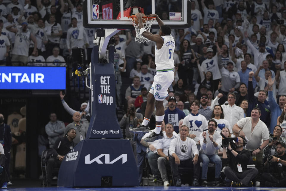 Minnesota Timberwolves guard Anthony Edwards dunks against then Denver Nuggets during the first half of Game 6 of an NBA basketball second-round playoff series Thursday, May 16, 2024, in Minneapolis. (AP Photo/Abbie Parr)