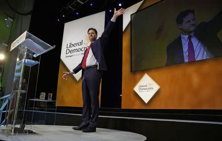 Britain's Deputy Prime Minister, and leader of the Liberal Democrats, Nick Clegg acknowledges delegates after delivering his keynote speech at the party's autumn conference in Glasgow, Scotland October 8, 2014. REUTERS/Russell Cheyne