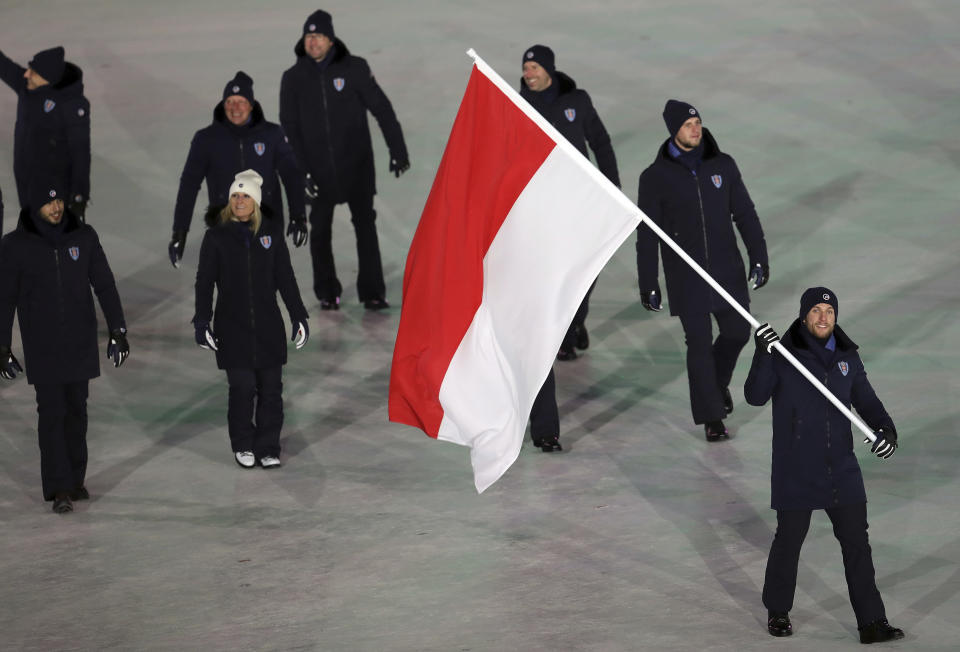 <p>Rudy Rinaldi carries the flag of Monaco, during the opening ceremony of the 2018 Winter Olympics in Pyeongchang, South Korea, Friday, Feb. 9, 2018. (AP Photo/Michael Sohn) </p>