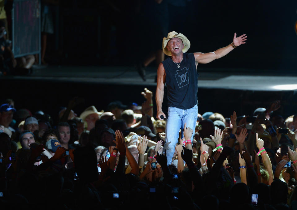 Kenny Chesney -- Entertainer of the Year Nominee <br><p> Musician Kenny Chesney performs during the Brothers of the Sun tour at MetLife Stadium on August 11, 2012 in East Rutherford, New Jersey. (Photo by Michael Loccisano/Getty Images)</p>