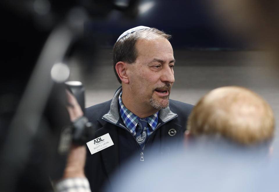 Scott L. Levin, Mountain States regional director of the Anti-Defamation League, speaks to reporters after a news conference in Denver Monday, Nov. 4, 2019, at which officials announced the arrest of a man who repeatedly espoused anti-Semitic views in a plot to bomb a historic Colorado synagogue in Pueblo. Richard Holzer, 27, of Pueblo, was charged with a federal hate crime for plotting to blow up the Temple Emmanuel Synagogue in the southern Colorado city. (AP Photo/David Zalubowski)