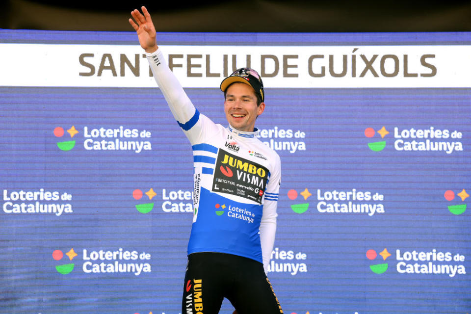 SANT FELIU DE GUIXOLS SPAIN  MARCH 20 Primoz Roglic of Slovenia and Team JumboVisma celebrates at podium as Blue points jersey winner during the 102nd Volta Ciclista a Catalunya 2023 Stage 1 a 1646km stage from Sant Feliu de Guxols to Sant Feliu de Guxols  VoltaCatalunya102  on March 20 2023 in Sant Feliu de Guixols Spain Photo by David RamosGetty Images
