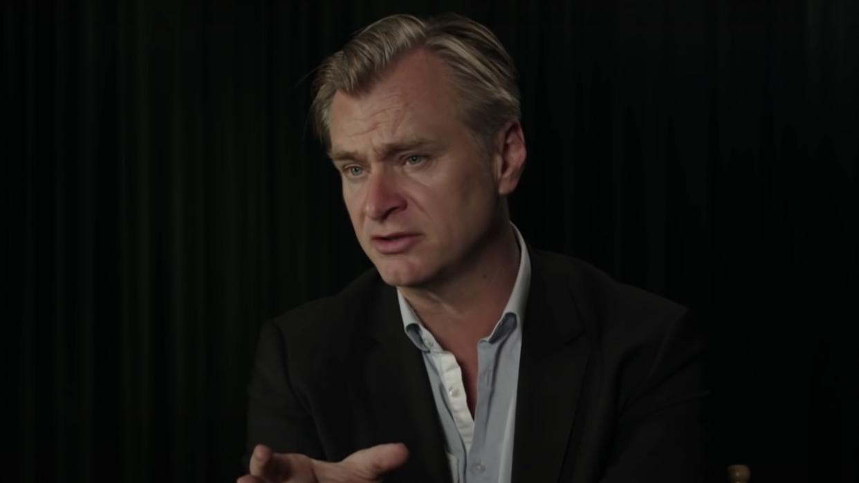  Christopher Nolan speaking in Tenet behind-the-scenes featurette. 