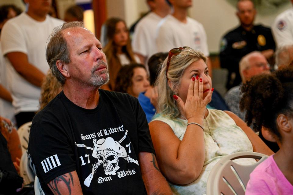 Community members listen to first-hand experiences at the World Trade Center at the 9/11 ceremony at the Lake County Historical Courthouse in Tavares on Sunday.