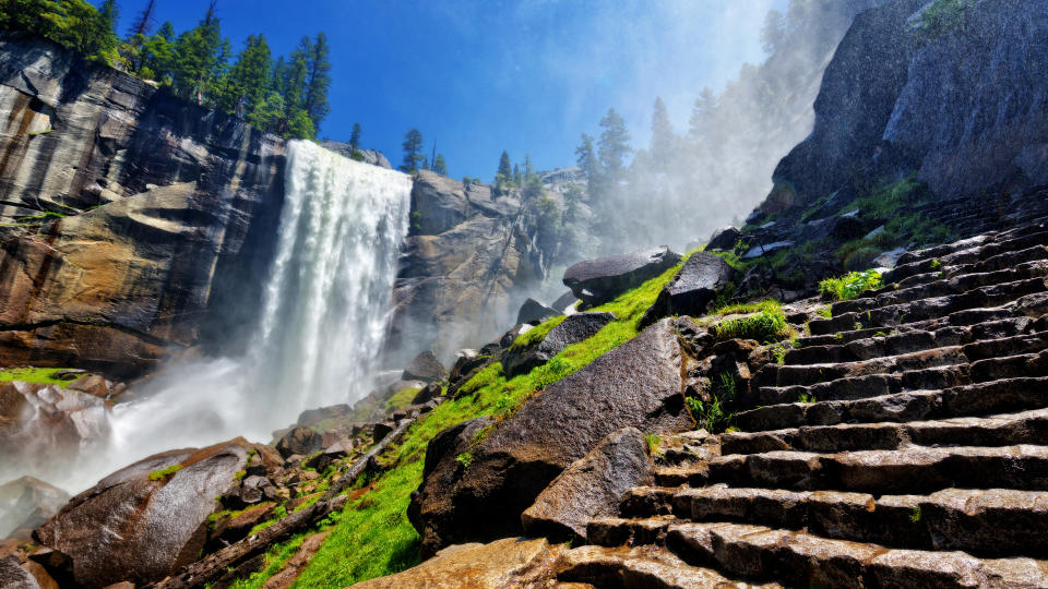 Heavy spray from Vernal Falls along the Mist Trail in early summer in Yosemite National Park