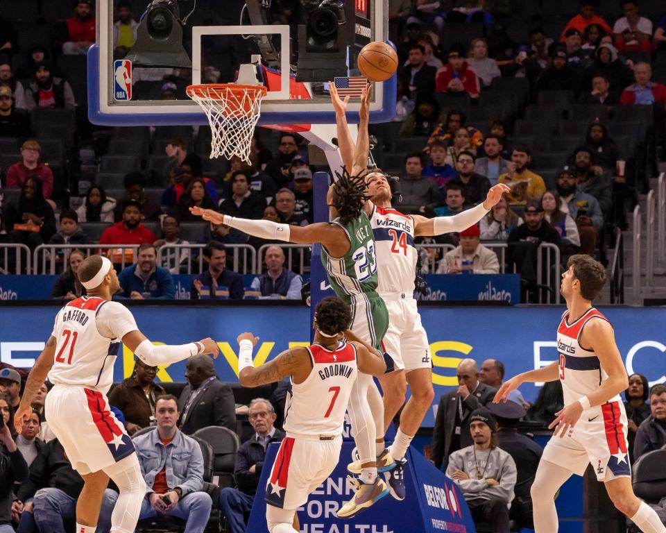 Washington Wizards forward Corey Kispert (24) defends against Detroit Pistons guard Jaden Ivey (23) in the first quarter at Little Caesars Arena in Detroit on Tuesday, March 7, 2023.