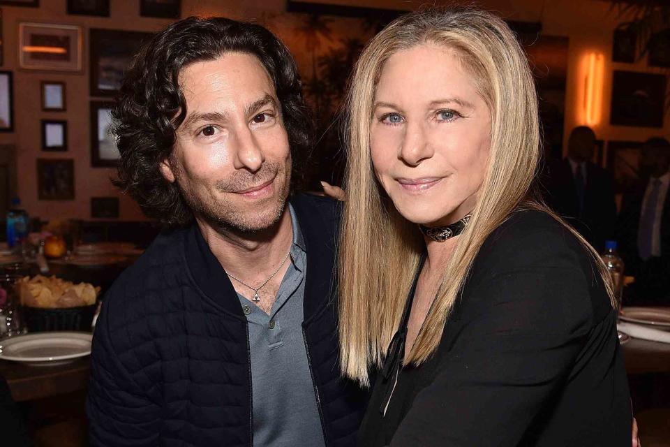 <p>Kevin Mazur/WireImage</p> Jason Gould and mom Barbra Streisand in 2017