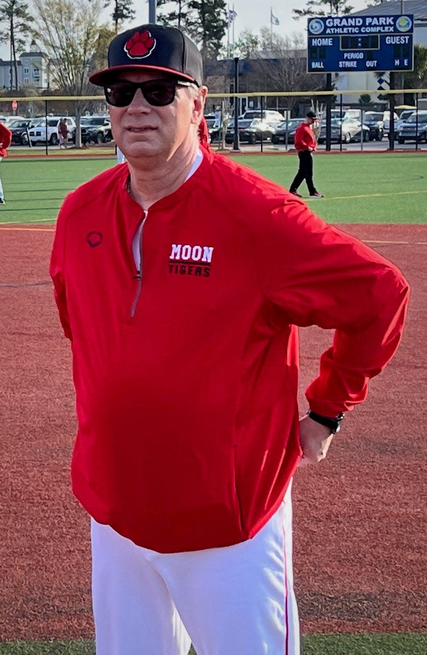 New Moon Tigers' head coach Rich Rowe looks on during Moon's trip to the Ripken Experience in Myrtle Beach, SC.