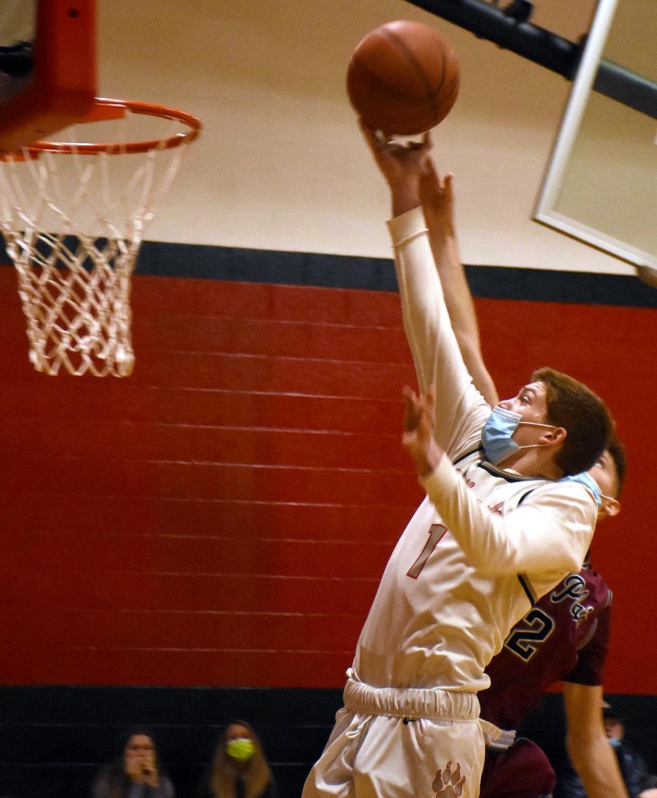 Paetyn Logan-Dillenbeck attempts a layup for Oppenheim-Ephratah-St. Johnsville Wednesday during the Coach Cutspec Holiday Classic championship game against Fort Plain.