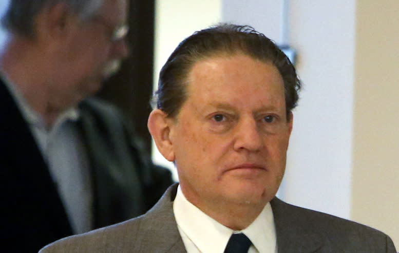 Byron Smith, left, heads into court for his hearing, Tuesday, April 29, 2014, in Little Falls, Minn. Smith, a Minnesota homeowner shot and killed two teenagers during a 2012 Thanksgiving Day break-in, was convicted of premeditated murder. The jury took only about three hours to reject his claim of self-defense. He was immediately sentenced to life without parole. Smith was immediately sentenced to life without parole. (AP Photo/The Star Tribune, David Joles) MANDATORY CREDIT; ST. PAUL PIONEER PRESS OUT; MAGS OUT; TWIN CITIES TV OUT.