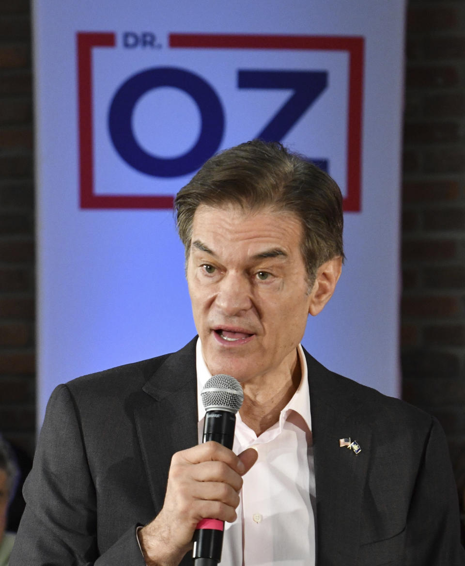 Mehmet Oz, the TV celebrity and heart surgeon who is running for the Republican nomination for U.S. Senate in Pennsylvania, speaks at a town hall-style event at the Newtown Athletic Club, Feb. 20, 2022, in Newtown, Pa. (AP Photo/Marc Levy)