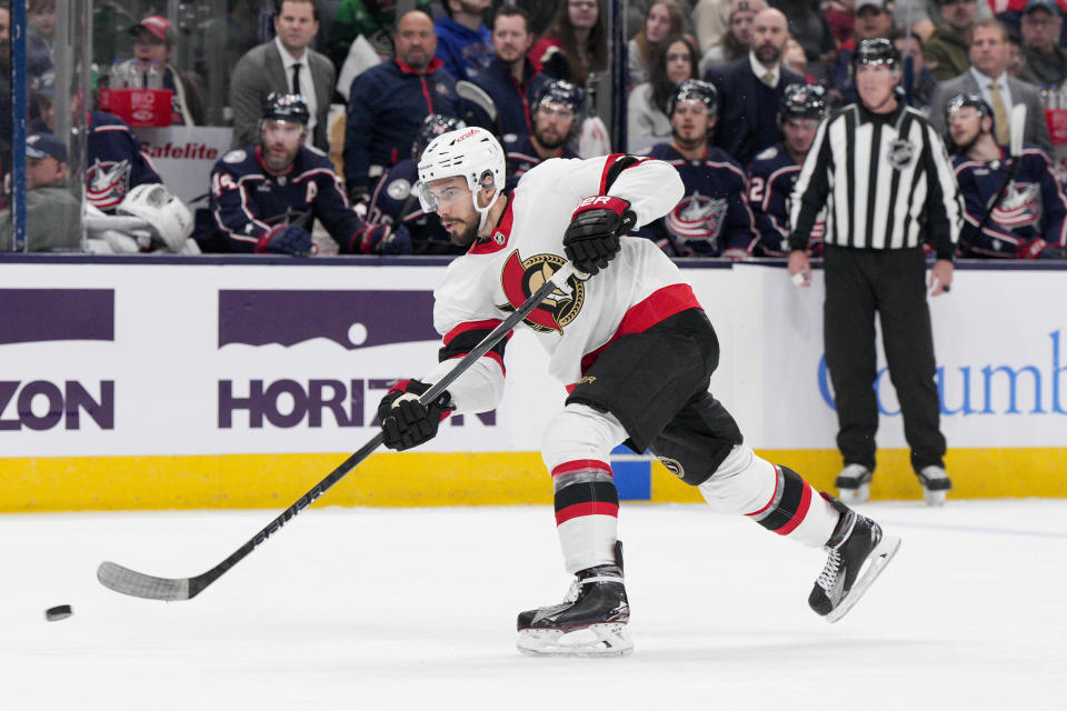 Ottawa Senators' Artem Zub shoots during the first period of an NHL hockey game against the Columbus Blue Jackets Thursday, March 14, 2024, in Columbus, Ohio. (AP Photo/Jeff Dean)