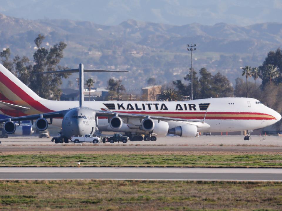 In this Wednesday, Jan. 29, 2020, file photo an airplane carrying U.S. citizens being evacuated from Wuhan, China, lands at March Air Reserve Base in Riverside, Calif.