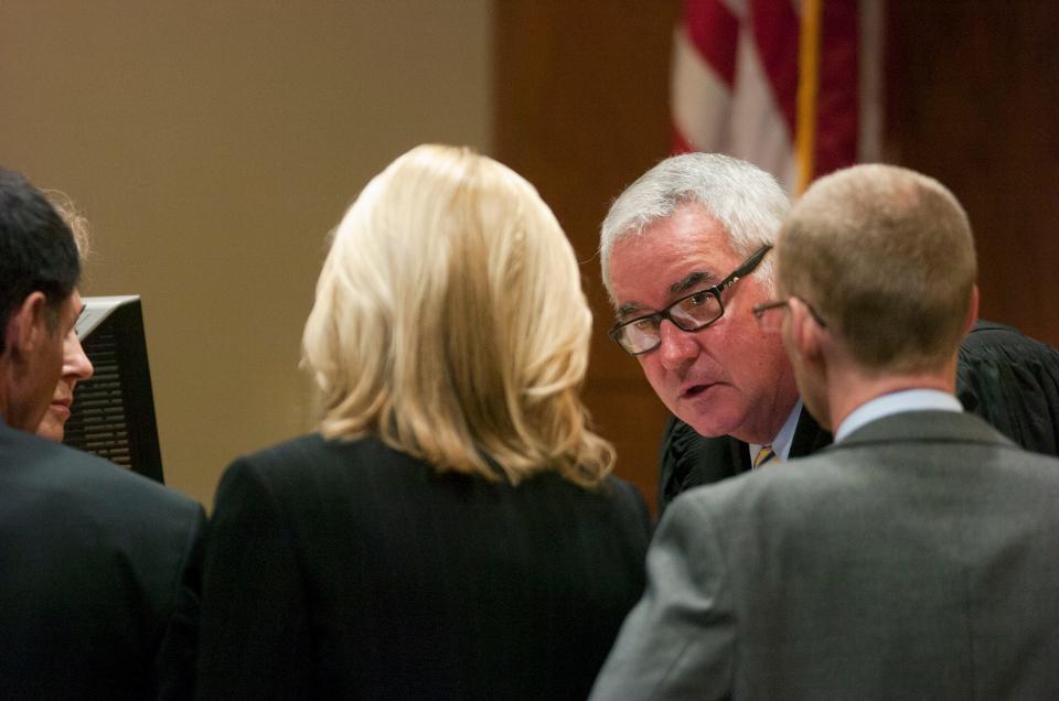 Circuit Judge Rick DeFuria addresses attorneys as day three of jury selection begins in the Shawn Tyson murder trial at the Sarasota County Courthouse on Tuesday, Mar. 20, 2012. Tyson is charged in the killings of British tourists James Cooper and James Kouzaris. (POOL PHOTO, Elaine Litherland/Sarasota Herald-Tribune)