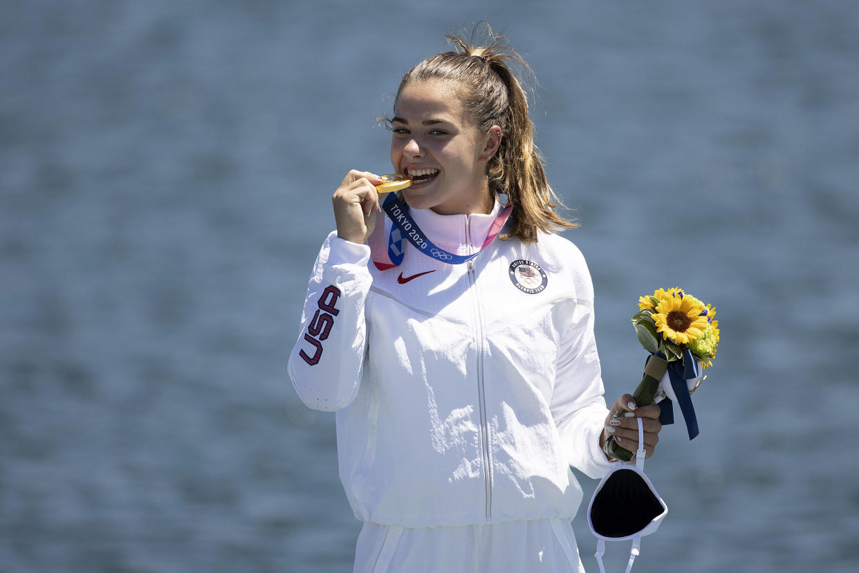 Gold medalist Nevin Harrison of Team USA celebrates at the medal ceremony following the Women's Canoe Single 200m Final A on Day 13 of the Tokyo 2020 Olympic Games at Sea Forest Waterway on August 5, 2021. / Credit: Laurence Griffiths / Getty Images