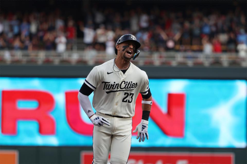 Royce Lewis rounds the bases after hitting a two-run homer in the first inning of Game 1.