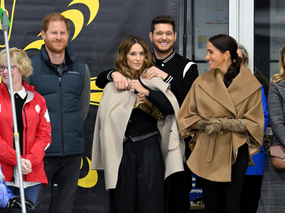 Prince Harry, Duke of Sussex, Luisana Lopilato, Michael Bublé and Meghan, Duchess of Sussex attend the Invictus Games One Year To Go Winter Training Camp at Hillcrest Community Centre on February 16, 2024.