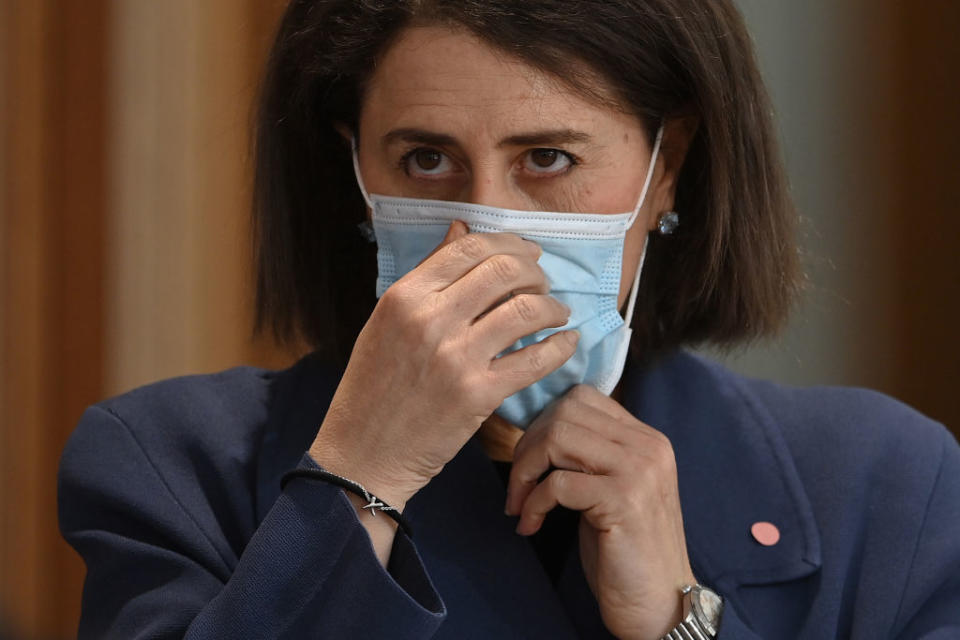 NSW Premier Gladys Berejiklian looks on during a press conference in Sydney.