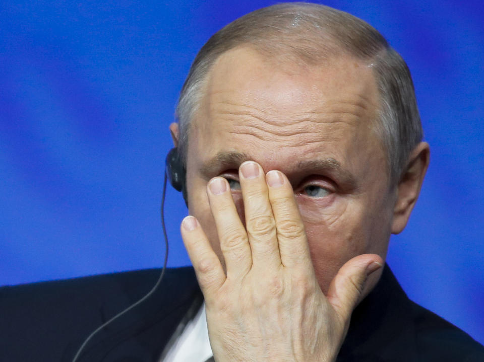 Russian President Vladimir Putin gestures as he attends a plenary session of the International Arctic Forum in St. Petersburg, Russia, Tuesday, April 9, 2019. (AP Photo/Dmitri Lovetsky)