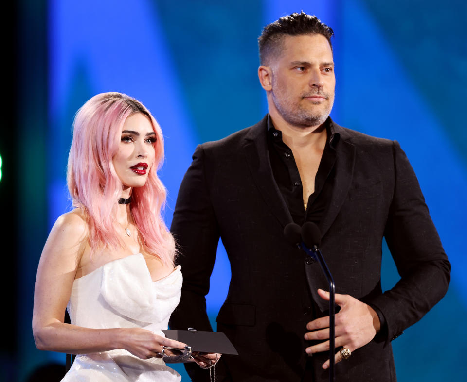 Megan Fox and Joe Manganiello present an award at the 2024 People's Choice Awards.