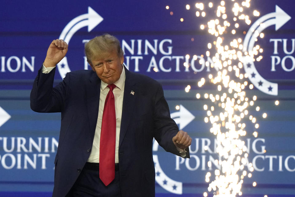 Former President Donald Trump dances on stage at the Turning Point Action conference, Saturday, July 15, 2023, in West Palm Beach, Fla. (AP Photo/Lynne Sladky)