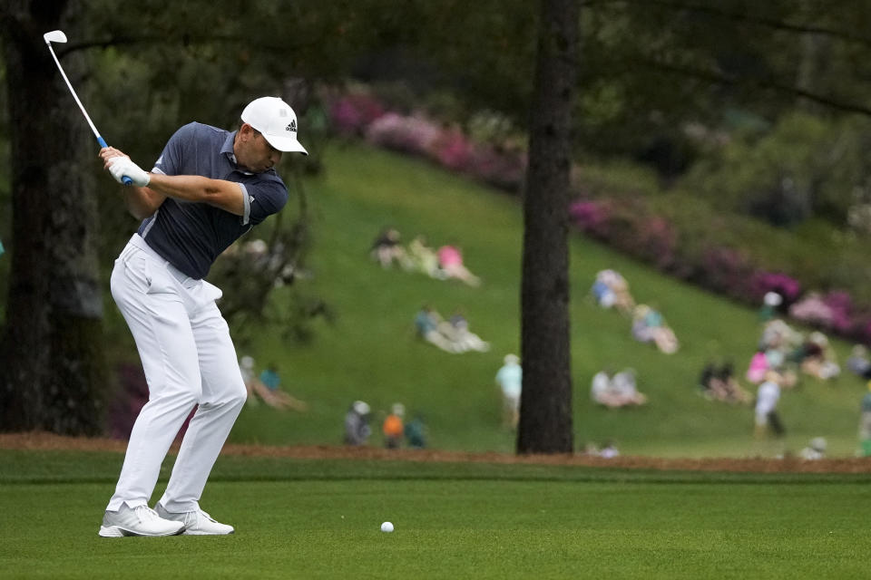 Sergio Garcia, of Spain, hits from the fairway on the 15th hole during the second round of the Masters golf tournament on Friday, April 9, 2021, in Augusta, Ga. (AP Photo/Charlie Riedel)