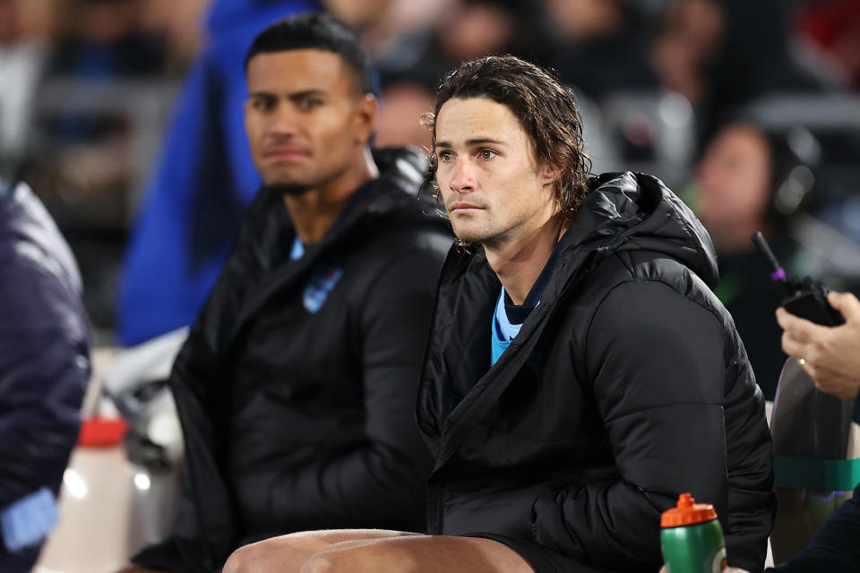 SYDNEY, AUSTRALIA - JUNE 08: Nicho Hynes of the Blues watches on from the sideline during game one of the 2022 State of Origin series between the New South Wales Blues and the Queensland Maroons at Accor Stadium on June 08, 2022, in Sydney, Australia. (Photo by Mark Kolbe/Getty Images)