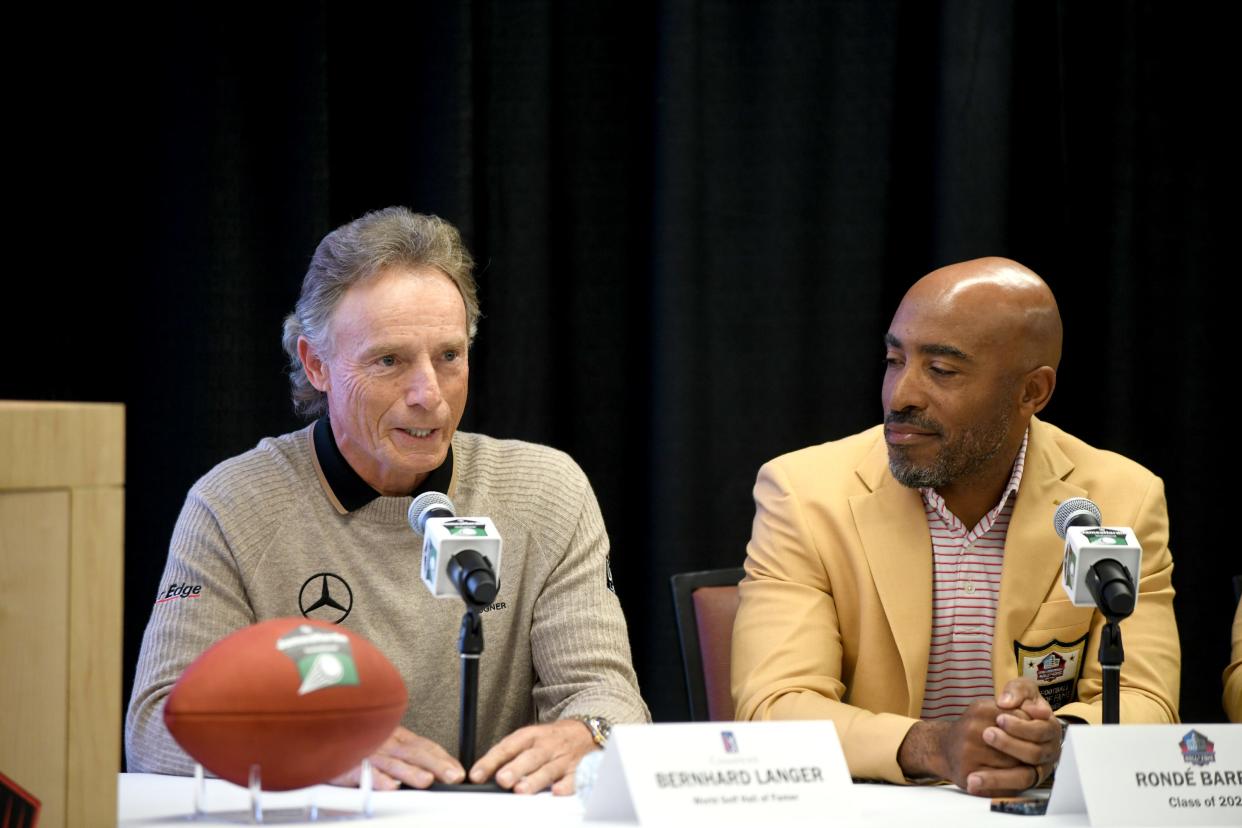 World Golf Hall of Famer Bernhard Langer answers questions as Pro Football Hall of Famer Ronde Barber listens Jan. 23, 2024, during the announcement of The James Hardie Pro Football Hall of Fame Invitational, which debuts in 2025 in Boca Raton, Florida.