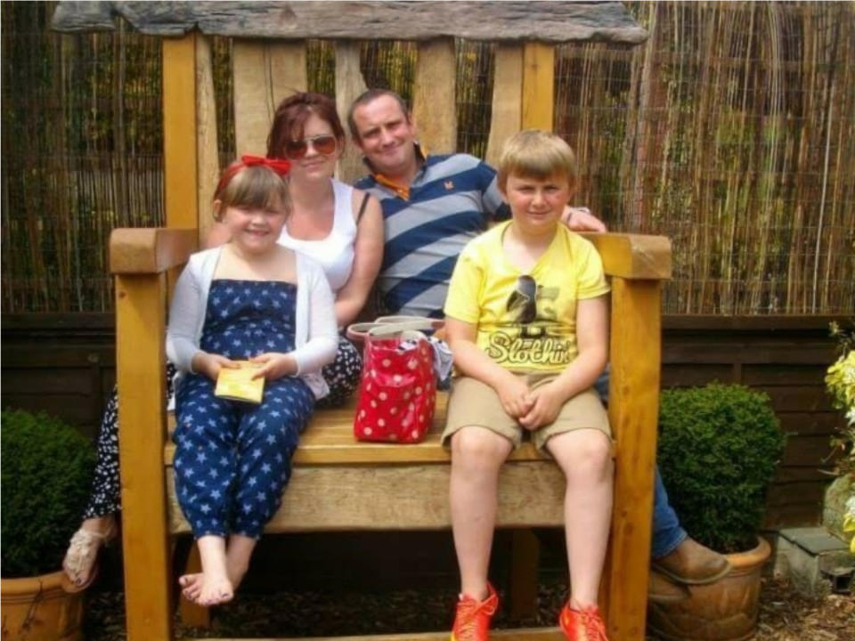 Claire Griffiths, pictured with her family, feels immense mum guilt due to all the things she now can't do due to the pain (supplied, Claire Griffiths)