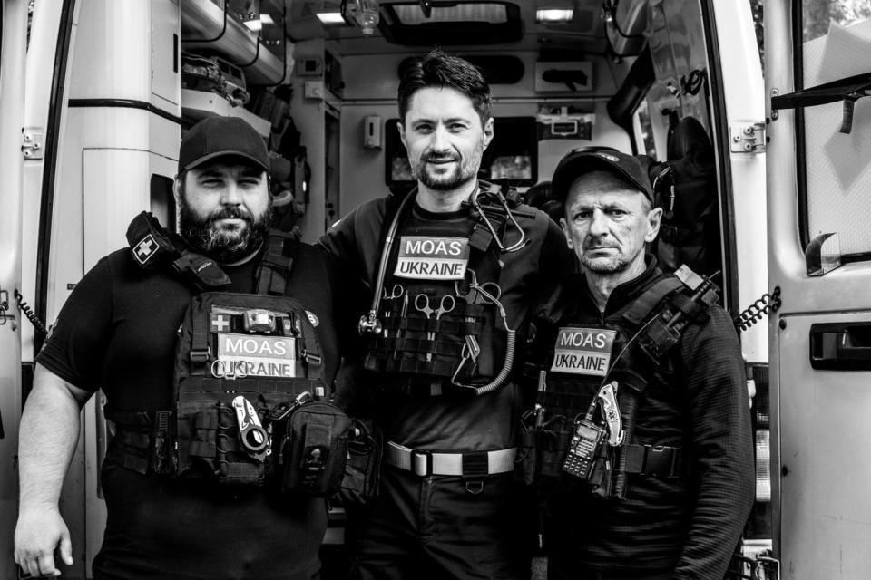 MOAS doctor Yurii and his team pose in front of an ambulance in Ukraine during Russia's full-scale war against Ukraine, date unknown. (Courtesy MOAS)