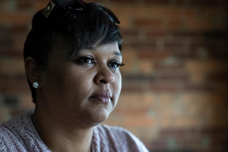 Danyette Smith is nearly two years into her role as the city's first director of domestic violence prevention. Nearly ten years ago, Smith escaped a decade-long abusive relationship, which fuels her advocacy work. "That's when I just looked up to the sky and was like, I want to get out of this. I'm going to be who I need," Smith remembered. In 2014, she started a nonprofit, Silent No More, to provide the support she says she needed during the height of her abuse. Now she leads the Indy Champions, a team of advocates who work to streamline the city's various domestic violence resources, support survivors directly, and provide education to the community and Indy's public safety teams. Pictured, Smith poses for a portrait Thursday, March 9, 2023, at her office in Indianapolis.