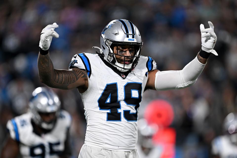 CHARLOTTE, NORTH CAROLINA - SEPTEMBER 18: Frankie Luvu #49 of the Carolina Panthers celebrates a defensive stop against the New Orleans Saints during the third quarter in the game at Bank of America Stadium on September 18, 2023 in Charlotte, North Carolina. (Photo by Grant Halverson/Getty Images)