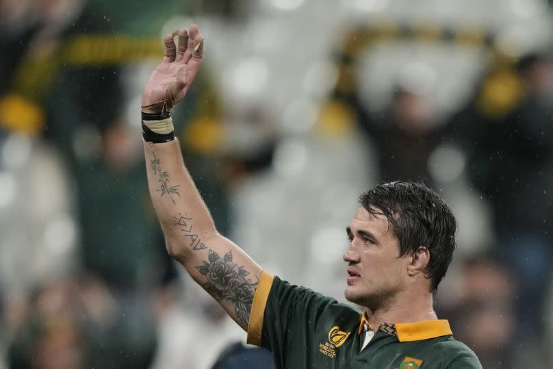 South Africa&apos;s Franco Mostert waves to the crowd after their 16-15 defeat of England in the Rugby World Cup semifinal match at the Stade de France