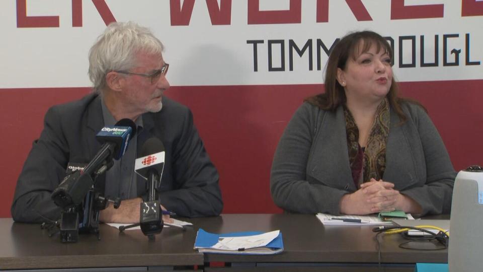 Lawyer, Steven Shrybman, left, and Ontario Health Coalition executive director Natalie Mehra, right, at a news conference on Tuesday, Feb. 13, 2023.