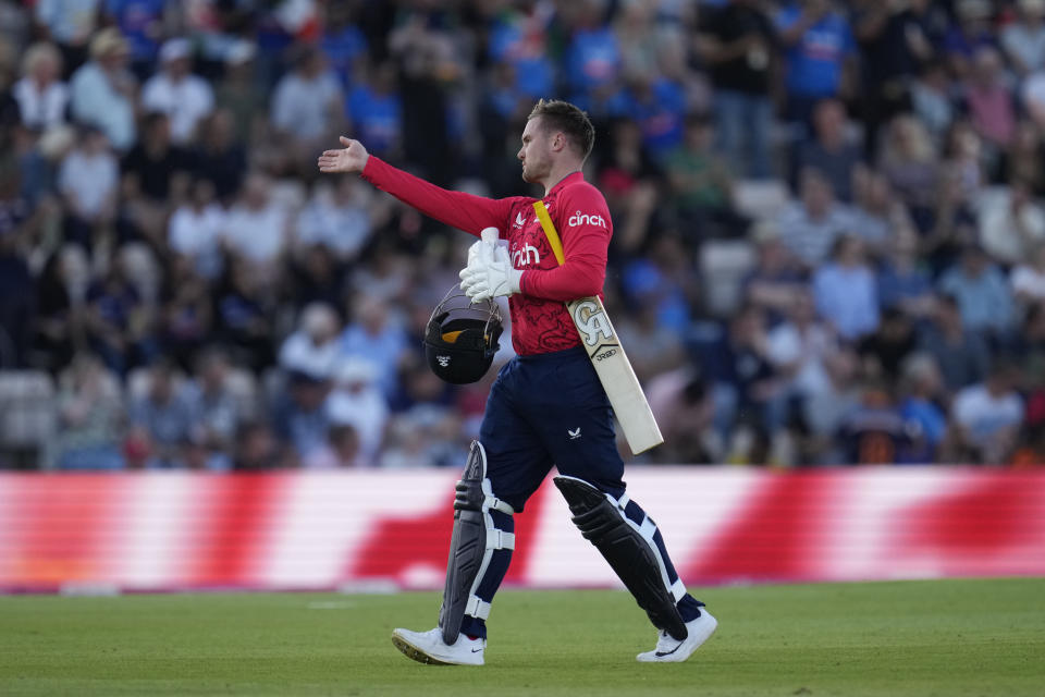 England's Jason Roy replays a shot with his arm as he walks off the field of play after losing his wicket from the bowling of India's Hardik Pandya during the first T20 international cricket match between England and India at The Ageas Bowl in Southampton, England, Thursday, July 7, 2022. (AP Photo/Matt Dunham)