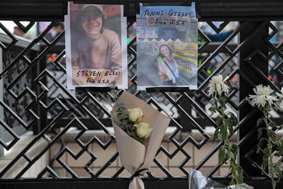 The photos of two US victims of the Seoul Halloween stampede, Steven Blesi and Anne Gieski, are seen at the scene of the stampede in Seoul, South Korea, 31 October 2022. According to the National Fire Agency, at least 154 people were killed and 149 were injured in the stampede on 29 October as a large crowd came to celebrate Halloween. Aftermath of Halloween stampede in Seoul, Korea - 31 Oct 2022