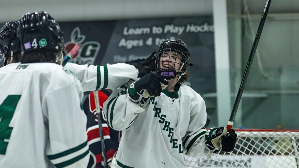 Marshfield's Tommy Carroll celebrates a goal during a game against Whitman-Hanson at The Bog in Kingston on Saturday, Feb. 18, 2023.