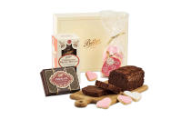 <p>Look to Yorkshire afternoon tea connoisseurs, Betty’s, for a pretty parcel sure to make your mum smile. We’re talking a hamper stuffed with chocolate orange buttery biscuits, rich chocolate ganache cake and love heart-shaped treats. <a rel="nofollow noopener" href="https://www.bettys.co.uk/mother-s-day-gift-box" target="_blank" data-ylk="slk:Buy now;elm:context_link;itc:0;sec:content-canvas" class="link "><em>Buy now</em></a>. </p>