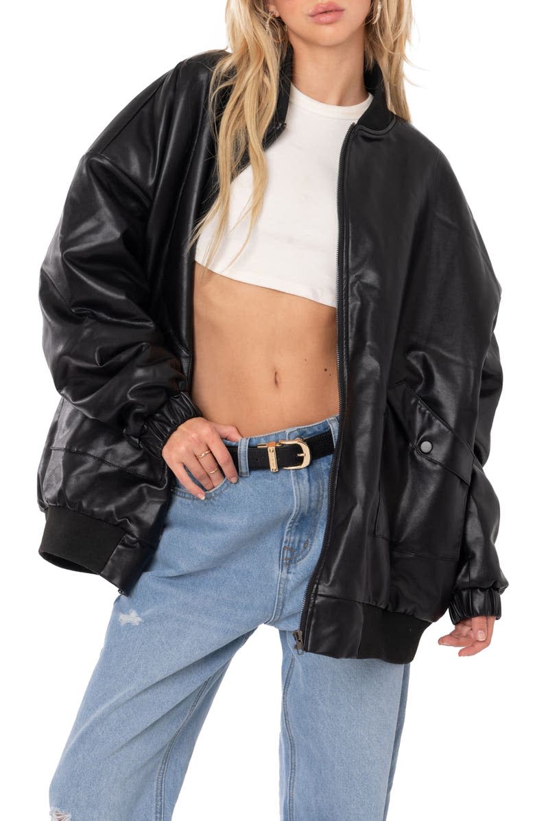 Hailey Bieber Pairs an Extra-Oversize Jacket With Tiny Track Shorts