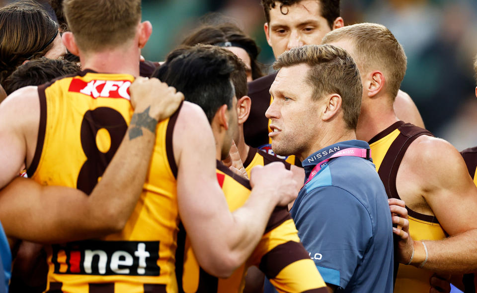 Sam Mitchell, pictured here speaking to the players during Hawthorn's clash with Geelong.
