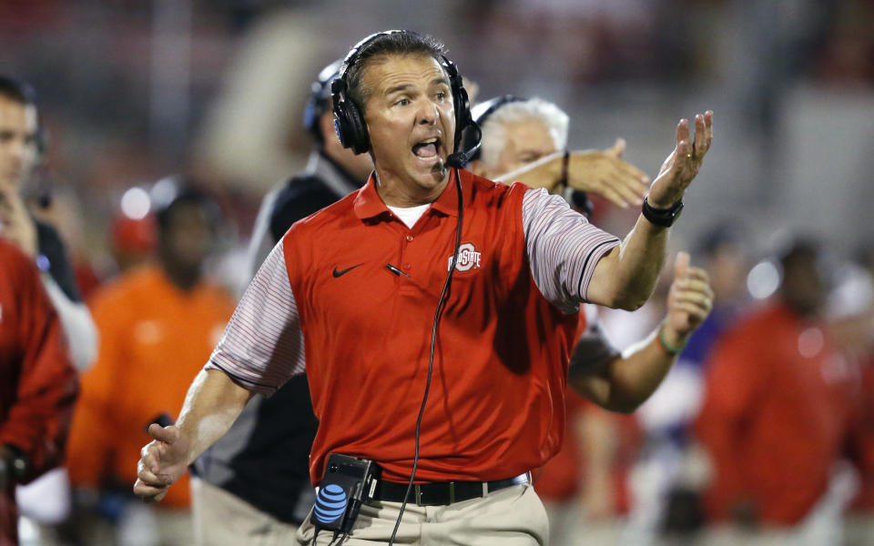 FILE - In this Sept. 17, 2016, file photo, Ohio State head coach Urban Meyer shouts from the sideline in the fourth quarter of an NCAA college football game against Oklahoma in Norman, Okla. The coaching staff at Rutgers knows the culture of the Ohio State football program as well as any opponent can. (AP Photo/Sue Ogrocki, File)