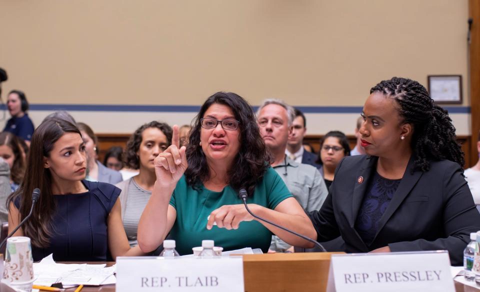 Democratic Representative from Michigan Rashida Tlaib (C) with Democratic Representative from New York Alexandria Ocasio-Cortez (L) and Democratic Representative from Massachusetts Ayanna Pressley (R) (EPA)