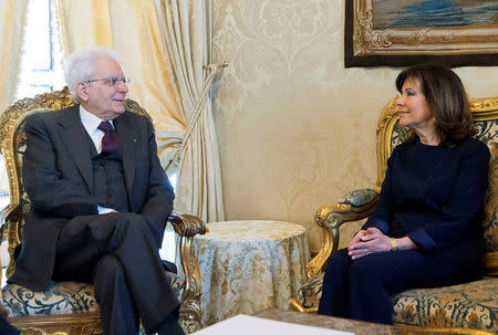 Italian President Sergio Mattarella speaks with new elected Senate president Maria Elisabetta Alberti Casellati at the Quirinale palace in Rome, Italy, April 18, 2018. Italian Presidential Press Office/Handout via REUTERS