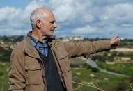 Eyewitness Charles Sammut, who lives on a hill opposite the home of assassinated anti-corruption journalist Daphne Caruana Galizia, speaks to Reuters in Bidnija, Malta, February 21, 2018. Picture taken February 21, 2018. To match Special Report MALTA-DAPHNE/ REUTERS/Darrin Zammit Lupi