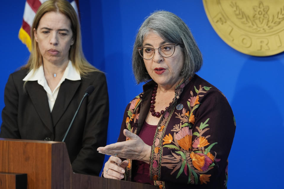 Miami-Dade County Mayor Daniella Levina Cava speaks at a news conference, Thursday, March 7, 2024, in Miami. The Miami Seaquarium, an old-Florida style tourist attraction that was home to Lolita, the beloved Orca that died last year, is being evicted from the waterfront property it leases from Miami-Dade County. Levine Cava cited a “long and troubling history of violations” in a lease termination notice sent Thursday to the chief executive officer of The Dolphin Company, which owns the Seaquarium. Miami Dade Commissioner Raquel Regalado listens at left. (AP Photo/Marta Lavandier)